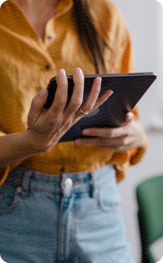 A dietitian holding a tablet