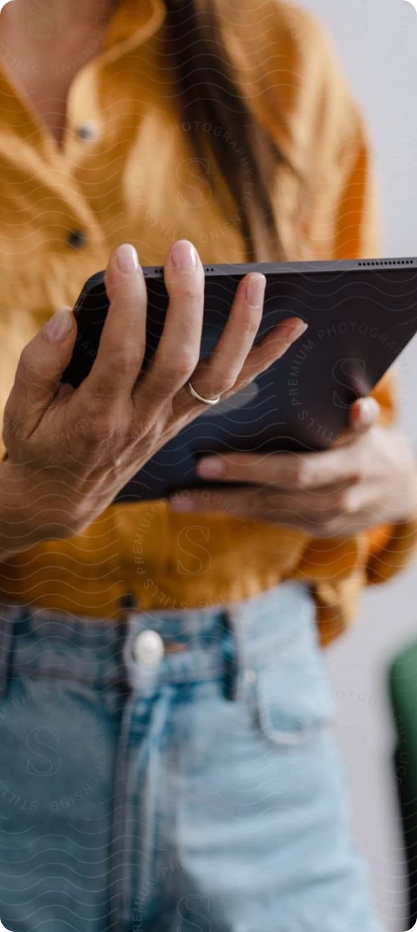 A dietitian holding a tablet